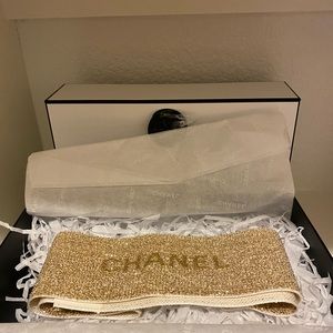 Empty Chanel holiday box with glitter ribbon